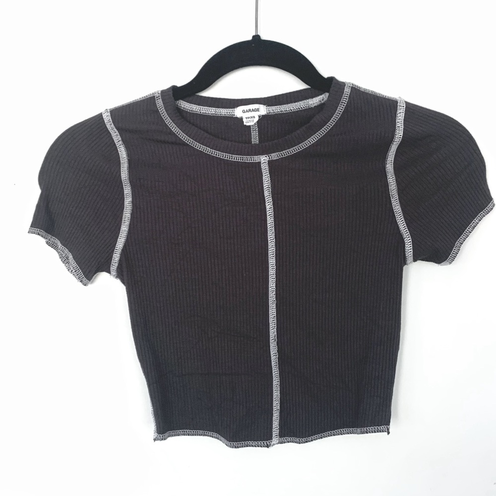 Garage, grey stitch top.
